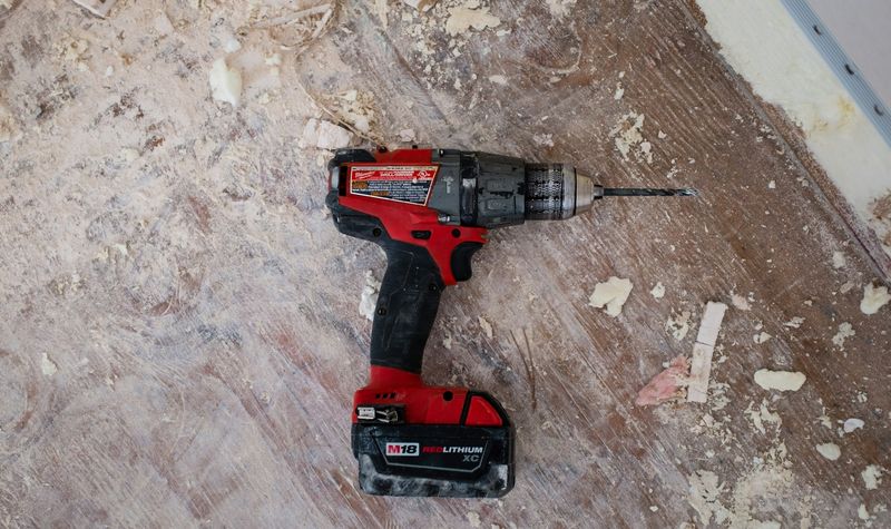 Handyman doing home repairs with tools